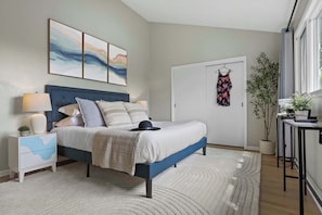 Master bedroom with king bed, coffee station, and private sitting room overlooking the Rock River