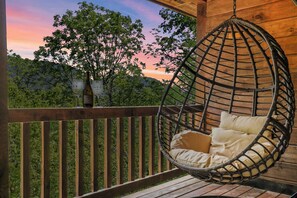 BIG CABIN - Egg chair on the big cabin deck overlooking the bluffs