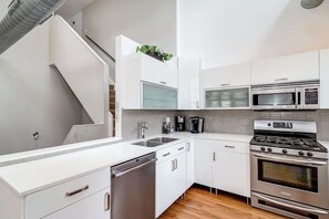 Living Room / Dining Room with Fully stocked kitchen
