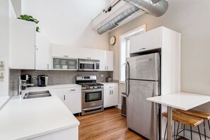 Living Room / Dining Room with Fully stocked kitchen