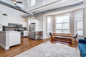 Living Room / Dining Room with Fully stocked kitchen