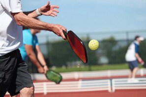 Pickleball Fun: Enjoy sunny days playing pickleball just steps from your vacation retreat!