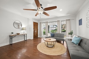 Relax in a spacious and inviting living room designed for comfort and style.