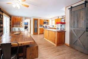 View of dining room that opens to kitchen.