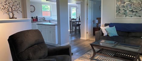 Open plan kitchen, dining and living rooms.