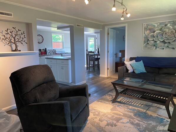Open plan kitchen, dining and living rooms. 