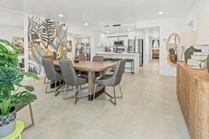 Spacious open-concept layout connects living, dining, and kitchen for easy entertaining.