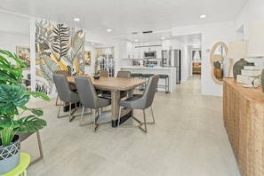 Spacious open-concept layout connects living, dining, and kitchen for easy entertaining.