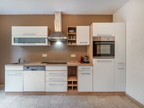 Kitchen Appliance, Kitchen, Cabinetry, Countertop, Major Appliance, Furniture, Interior Design, Flooring, Wood, Home Appliance