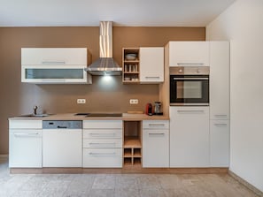 Kitchen Appliance, Kitchen, Cabinetry, Countertop, Major Appliance, Furniture, Interior Design, Flooring, Wood, Home Appliance