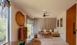 Spacious dining area seamlessly connected to the living room, perfect for shared meals and great conversations.