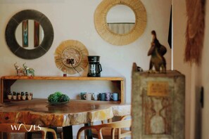 Earthy textures, artisan accents, and calming tones bring the essence of Tulum indoors.