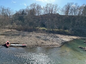Looking towards the house (visible through the trees above). Good fishing spot!