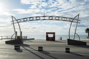 Just a five-minute drive from home, step through the iconic Surfers Paradise arch and straight onto golden sands.