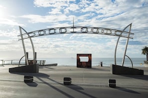 Just a five-minute drive from home, step through the iconic Surfers Paradise arch and straight onto golden sands.