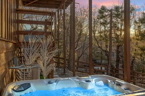 Relax in the private hot tub.