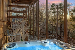 Relax in the private hot tub.