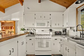 Whip up delicious meals in our fully stocked kitchen! We have an Nespresso and drip coffee maker (with all the fixings!), plus a grinder for fresh coffee.