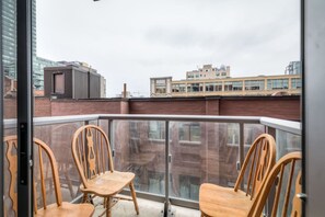 Step out and unwind on your private balcony with seating.