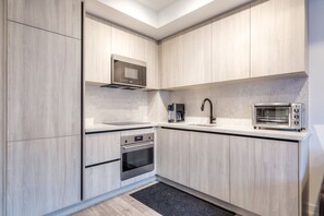 Cook with ease in a fully equipped kitchen with all appliances.