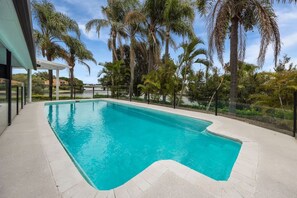 Spacious modern swimming pool with a wide beautiful water view!