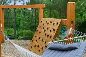 Outdoor Adventure Zone: Swing, climb, and relax amidst nature’s playground! Perfect for families!
