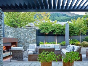 11 Aspen Grove Outdoor Courtyard with Seating Area and Outdoor Fireplace