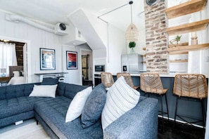 Curl up with a good book in the inviting living room