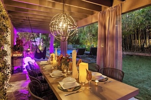 Enjoy beautiful al fresco dining on the covered outdoor patio, with amazing ambiance to create a special atmosphere.
