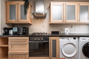 Kitchen/diner. Fully equipped with cooking equipment perfect for families. Appliances such as washer, fridge freezer, microwave, oven are free and available for your use. - Pool table available for relaxation