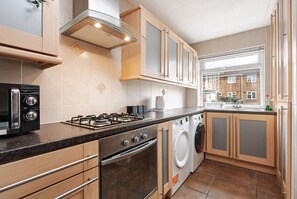 Kitchen/diner. Fully equipped with cooking equipment perfect for families. Appliances such as washer, fridge freezer, microwave, oven are free and available for your use. - Pool table available for relaxation
