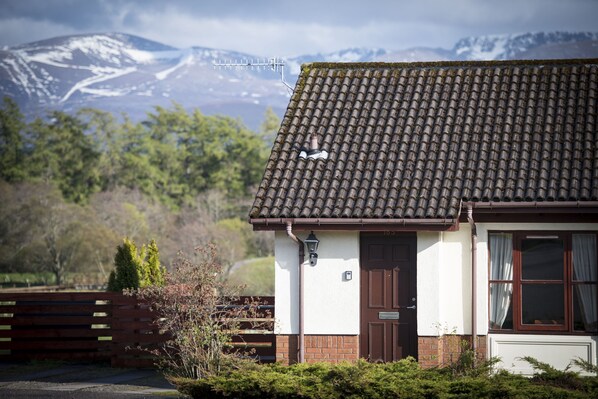 Dalfaber View with mountains behide the property