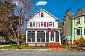 Charming riverfront home with a welcoming front porch—perfect for morning coffee or evening chats.