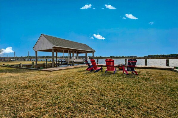 Relax riverside in Adirondack chairs and take in the view—just steps from your backyard.