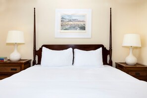 A classic bedroom with a four-poster bed and elegant decor for a restful stay.