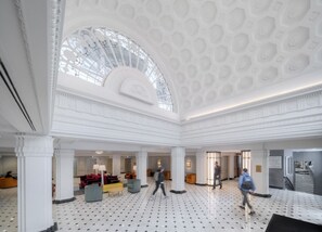 Architectural beauty meets modern luxury, with a stunning domed ceiling and elegant open space.