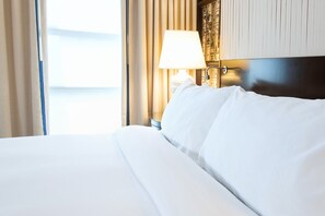 Cozy and inviting, with crisp linens and warm accents designed for ultimate relaxation.