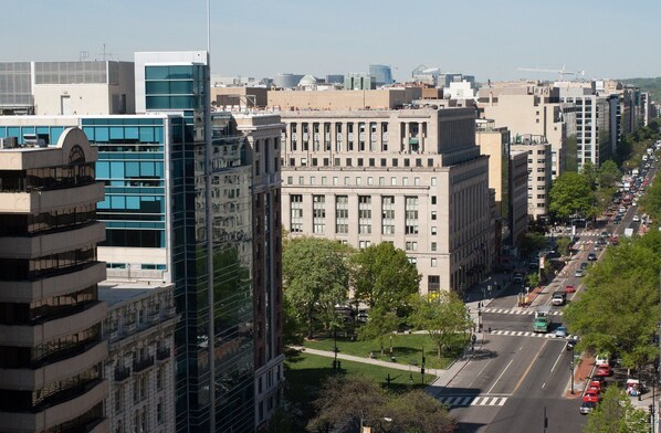 A breathtaking perspective of the city, with tree-lined streets and iconic architecture in view.