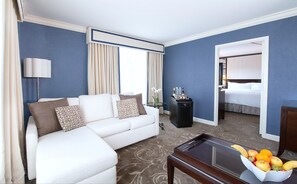 Spacious suite with refined details, featuring plush seating and thoughtful touches for a home-away-from-home feel.