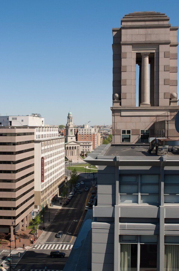 Expansive city views, offering a glimpse into the vibrant energy of the surrounding neighborhood.