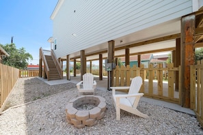 Enjoy s'mores & laughter by the crackling fire pit