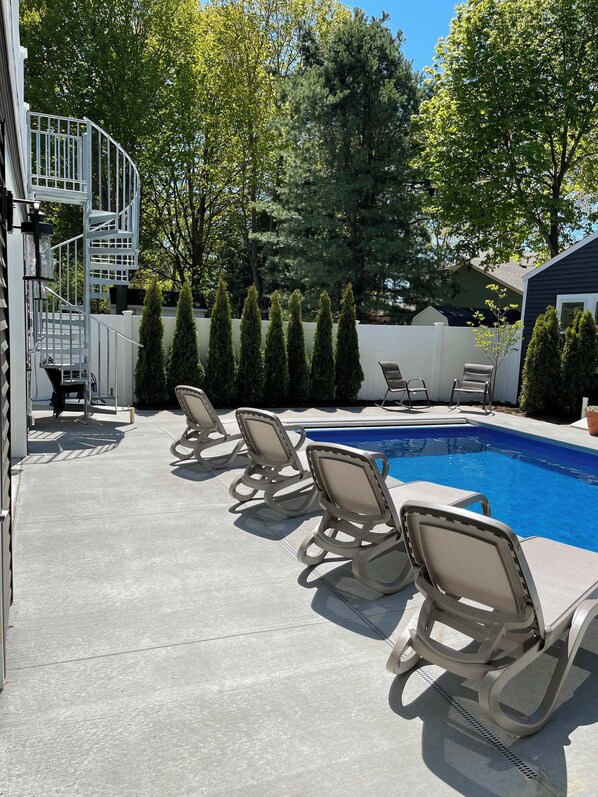 Spiral Staircase to rooftop deck of pool house