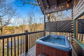 Unwind and recharge after a day of exploration in the private outdoor hot tub.