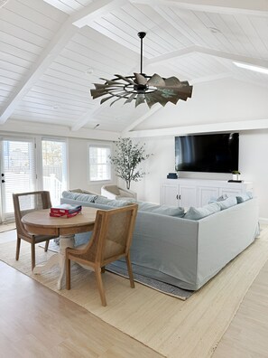 Family room opens to backyard deck and coi pond.