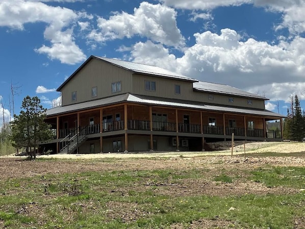 Front corner view of house as you drive up the lane