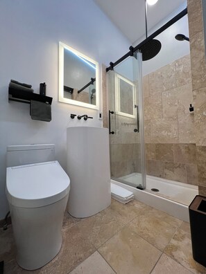 Main floor bathroom with Toto Bidet, heated seat, warm water wash, 16" rainhead,