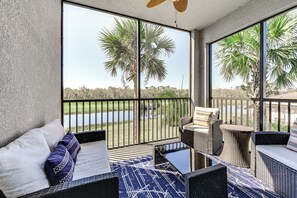 Screened-In Balcony | Pool & Pond Views