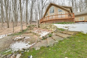 Cottage Exterior | Deck | Fire Pit | Wooded Surroundings