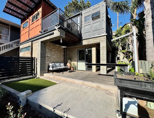 Front of house with outdoor living area