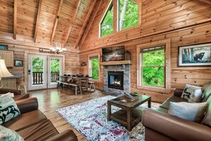 Large open space with cathedral ceiling and mountain feel